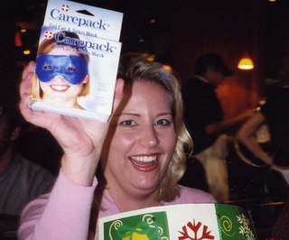 Khimetrcs White Elephant lunch -- Kate and her new toys