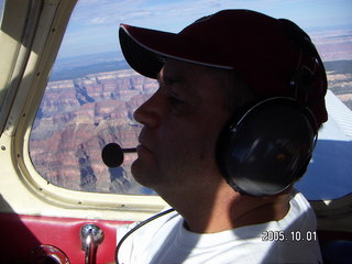 Tim Higel in silhouette over the Grand Canyon