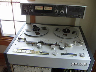 reel-to-reel tapes on shelves