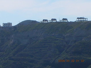 2006 eclipse trip -- approaching Santorini island -- half-built houses