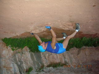 Plateau Point -- Mighty Colorado River -- Adam on rock ledge