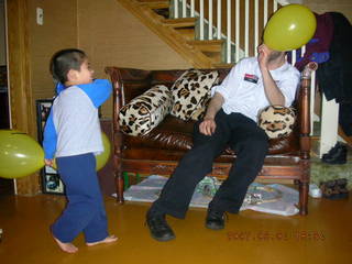 Gaby's fourth birthday -- Eric, Gaby, trains