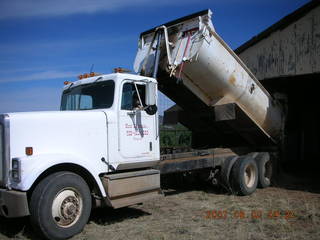 Young -- Chapman Ranch Airport - dump truck in the hangar