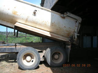 Young -- Chapman Ranch Airport - dump truck in the hangar