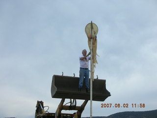 Young -- Chapman Ranch Airport - Bob working on wind sock circle
