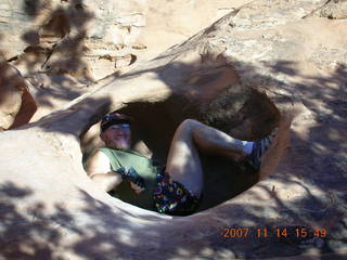 684 6be. Arches National Park - Devils Garden hike - Adam in hole in rock