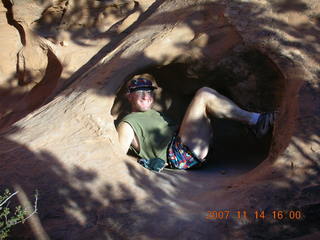 689 6be. Arches National Park - Devils Garden hike- Adam in hole in rock