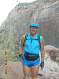 Arches National Park - Devils Garden hike - Adam in hole in rock
