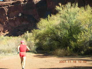 2 6bg. Canyonlands National Park - Lathrop Trail hike - Adam (tripod) running