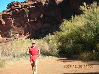 3 6bg. Canyonlands National Park - Lathrop Trail hike - Adam (tripod) running