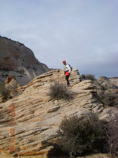 734 6cv. Zion National Park - Angels Landing hike - Adam climbing at the top