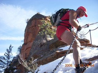 811 6eu. Zion National Park - Angels Landing hike - Adam coming down the icy part
