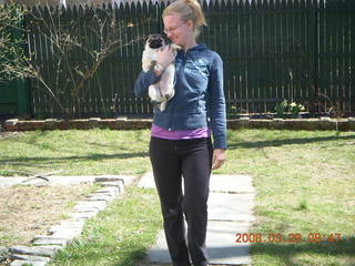 2006 eclipse trip -- Cambridge -- Richard and Jane under umbrella further back on sidewalk