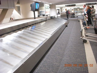 68 6l6. eclipse - white line in baggage retrieval area