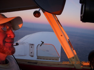 Adam flying N4372J at sunrise