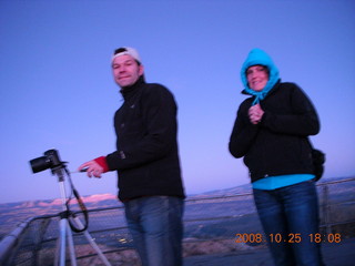 481 6nr. Bryce Canyon - sunset view at Bryce Point - German tourists taking pictures in very low light