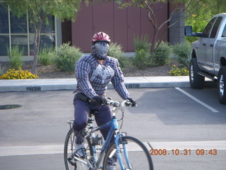 Adam as Spiderman on Halloween riding bike