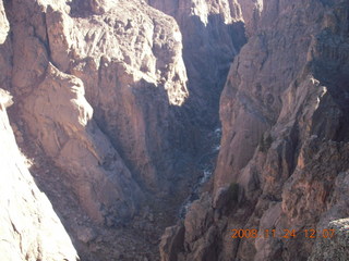 Black Canyon of the Gunnison National Park sign and view