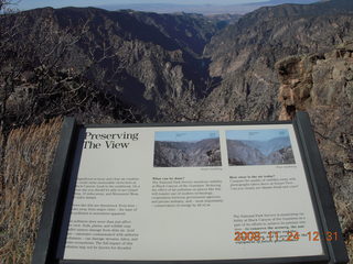 Black Canyon of the Gunnison National Park sign and view