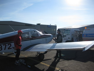 beth's Saturday zion-trip pictures - Adam with N4372J and fueling fellow