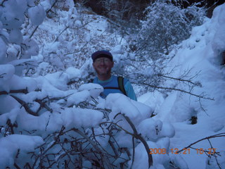 969 6qm. Zion National Park - Emerald Pools hike - Adam through snowy tree