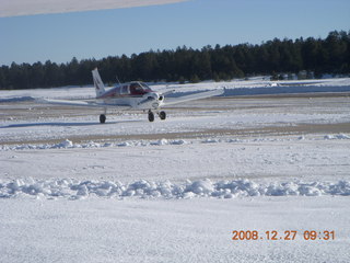 cold snowy road near Flagstaff Airport (FLG)
