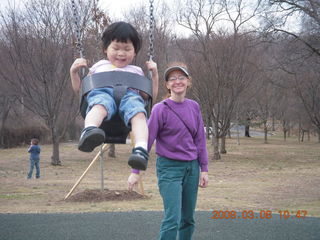422 6t8. Cecelia and Betsy at the swings