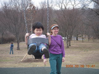423 6t8. Cecelia and Betsy at the swings