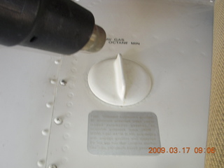 n4372j in shop with new engine - heat gun on old-decal glue