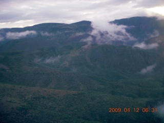 aerial - mountains near Red Creek with clouds