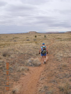 15 6uh. Canyonlands - Lathrop trail hike - Adam running - grassy run at end - back