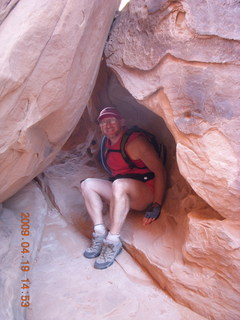 1018 6uk. Arches National Park - Fiery Furnace hike - Adam in a hole in the rock