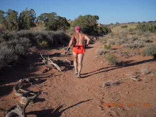 16 6uk. Canyonlands National Park - Murphy Trail run - Adam running - back