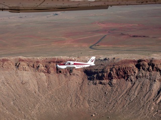 Markus's photo - aerial - Adam flying N4372J - in-flight photo at meteor crater