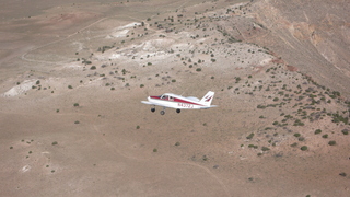 81 6ww. Markus's photo - meteor crater and N4372J in-flight photo