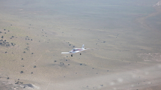 89 6ww. Markus's photo - meteor crater and N4372J in-flight photo