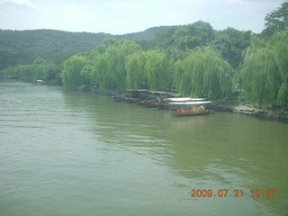 64 6xm. China eclipse - West Lake boat ride