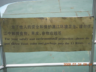 108 6xq. China eclipse - Li River  boat tour - sign