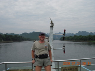 110 6xq. China eclipse - Li River  boat tour - Adam