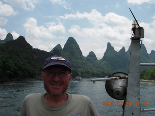 341 6xq. China eclipse - Li River  boat tour - Adam backlit