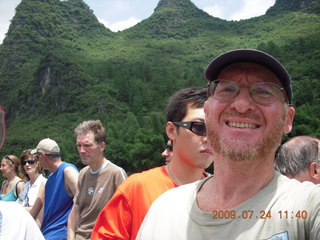 345 6xq. China eclipse - Li River  boat tour - Adam