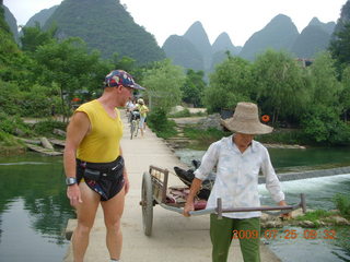 132 6xr. China eclipse - Yangshuo bicycle ride - walk to farm village - Adam and farm worker