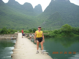 China eclipse - Yangshuo bicycle ride - walk to farm village - lady with water buffalo