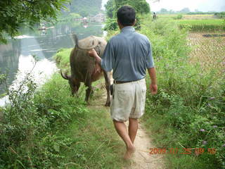 161 6xr. China eclipse - Yangshuo bicycle ride - walk to farm village