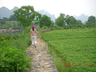 China eclipse - Yangshuo bicycle ride - walk to farm village - water buffalo in water