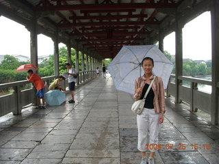 China eclipse - Guilin SevenStar park - Ling on flower bridge