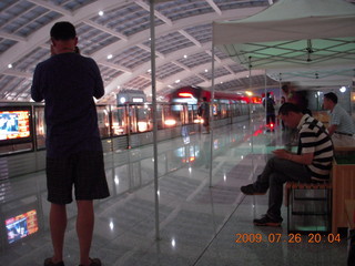 China eclipse - train at Beijing Airport station