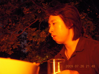 145 6xs. China eclipse - Jack in restaurant in park in Beijing (low light)