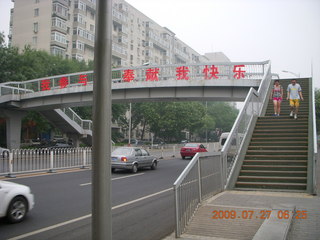 China eclipse - Beijing morning run - advertisement sign for Google