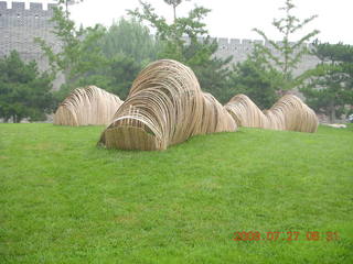 32 6xt. China eclipse - Beijing morning run - weird sculpture